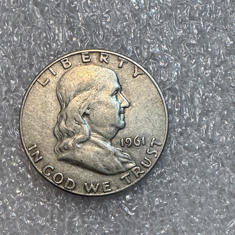 Silver Coin with Historical Design